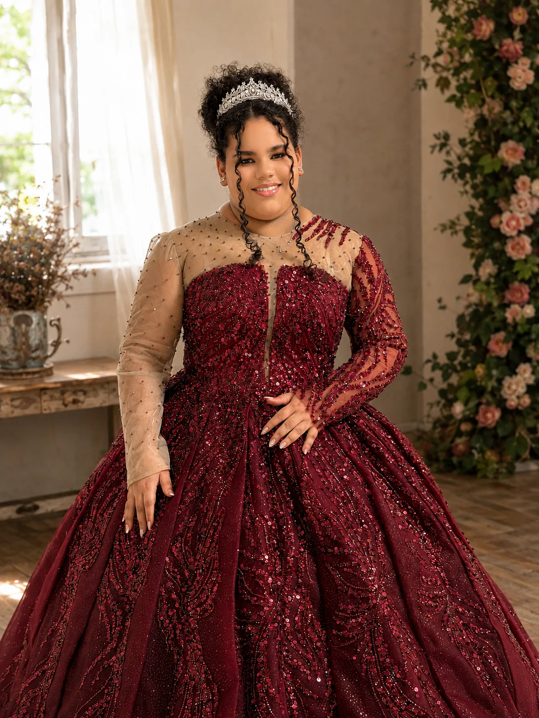 Rosewood burgundy ballgown with crystal beading and asymmetric sheer sleeves
